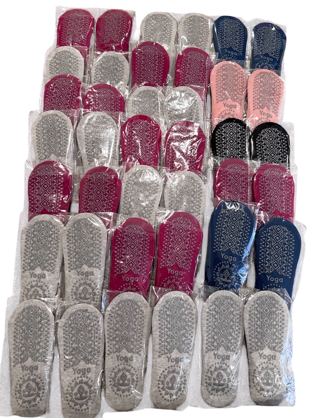 20 pairs of yoga socks. Women’s size medium(7-8) new in package